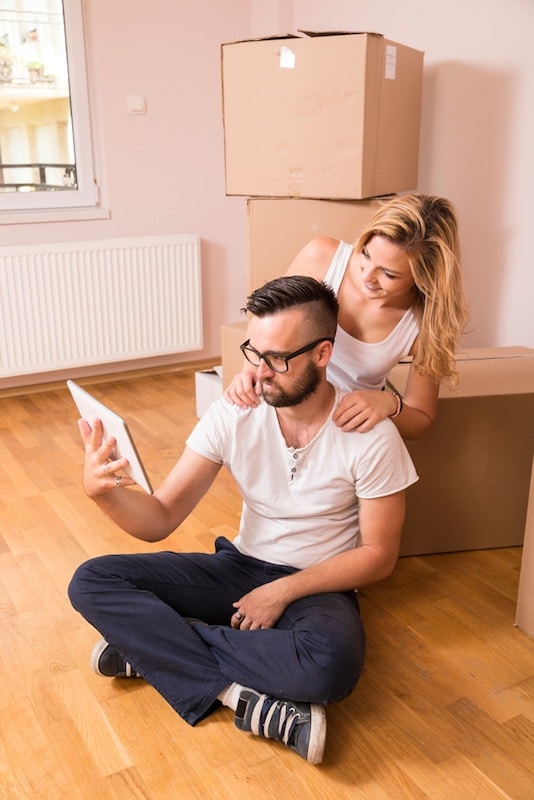 A couple filled with joy and gratitude after a hassle-free move with Liberty Moving, offering professional and timely moving services in Birmingham, AL.